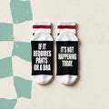 Bas de laine noir et blanc avec le message If it requires pants or a bra it's not happening today, boutique Sans Filtre