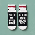 Bas de laine noir et rouge avec le message You're my faves bitch to bitch about bitches with, boutique Sans Filtre