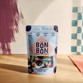 Sachet c est Bonbon Melange Doux 350 g sur fond bordeaux et damier, boutique Sans Filtre