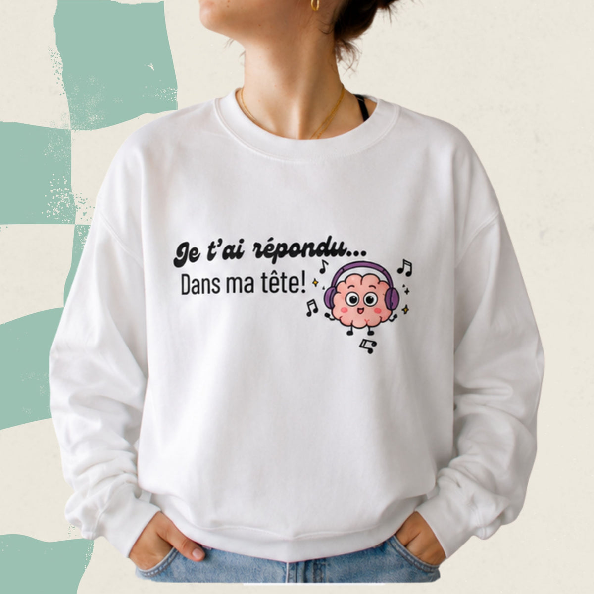 Chandail crewneck blanc avec cerveau illustre portant des ecouteurs et le message Je t'ai repondu... dans ma tete, boutique Sans Filtre