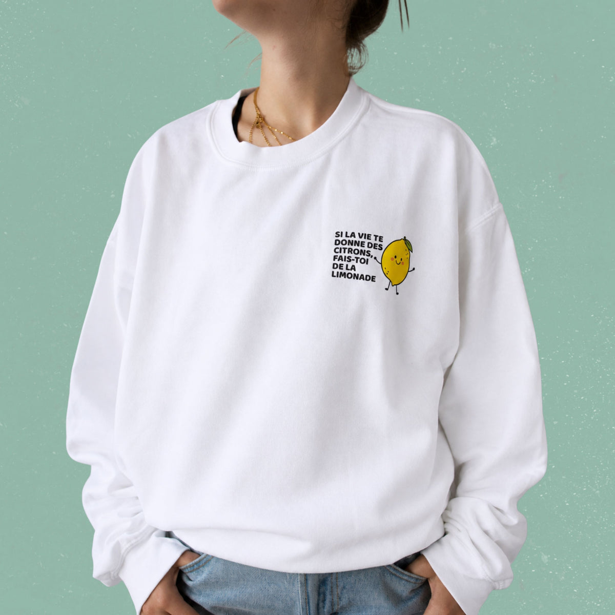 Chandail crewneck blanc avec citron illustre et le message Si la vie te donne des citrons, fais-toi de la limonade, boutique Sans Filtre