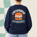 Dos d'un chandail crewneck bleu marine avec burger illustre et le message L'Interfromage la legende locale, boutique Sans Filtre