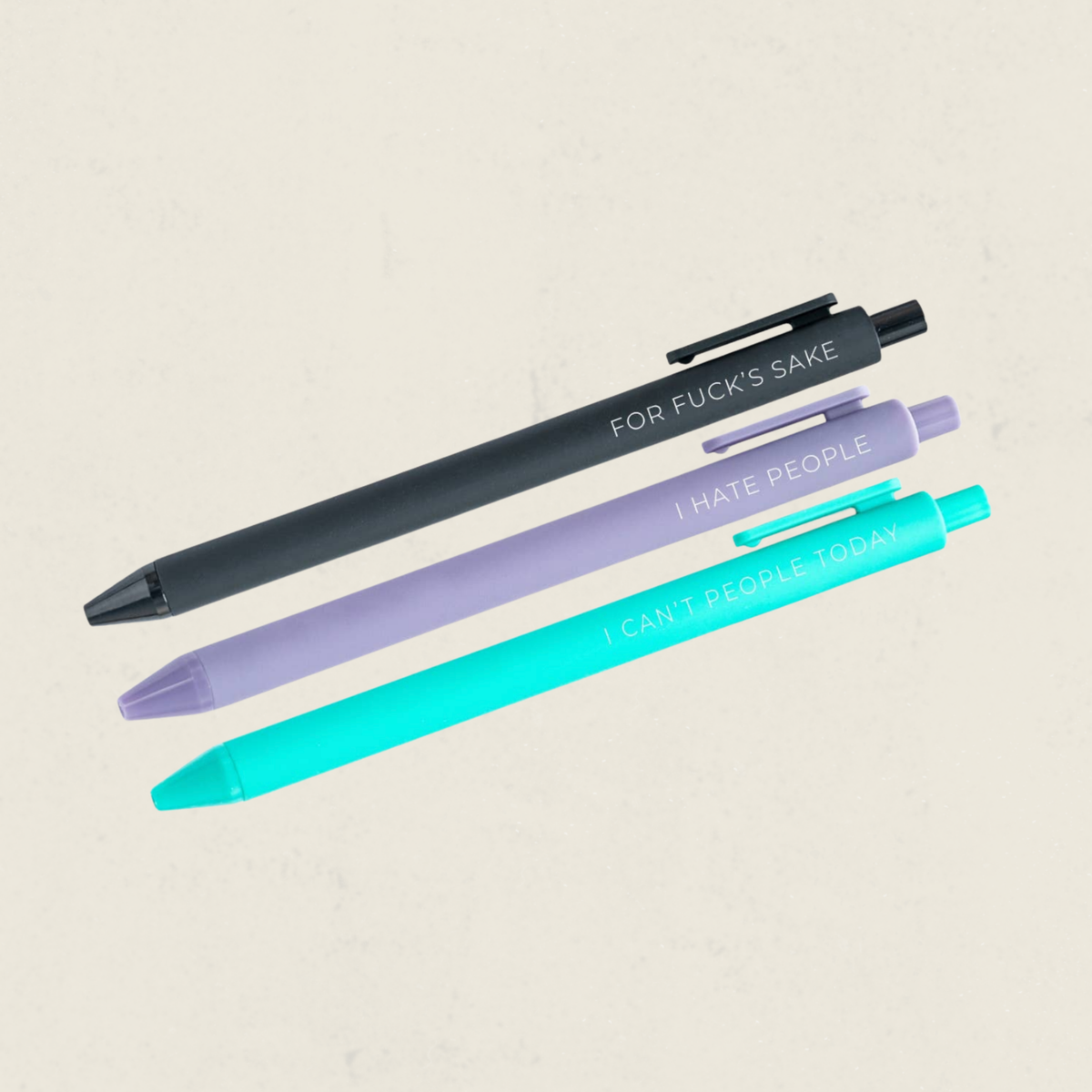 Ensemble de trois stylos noir lilas et turquoise avec messages humoristiques for fuck's sake et I hate people, boutique Sans Filtre