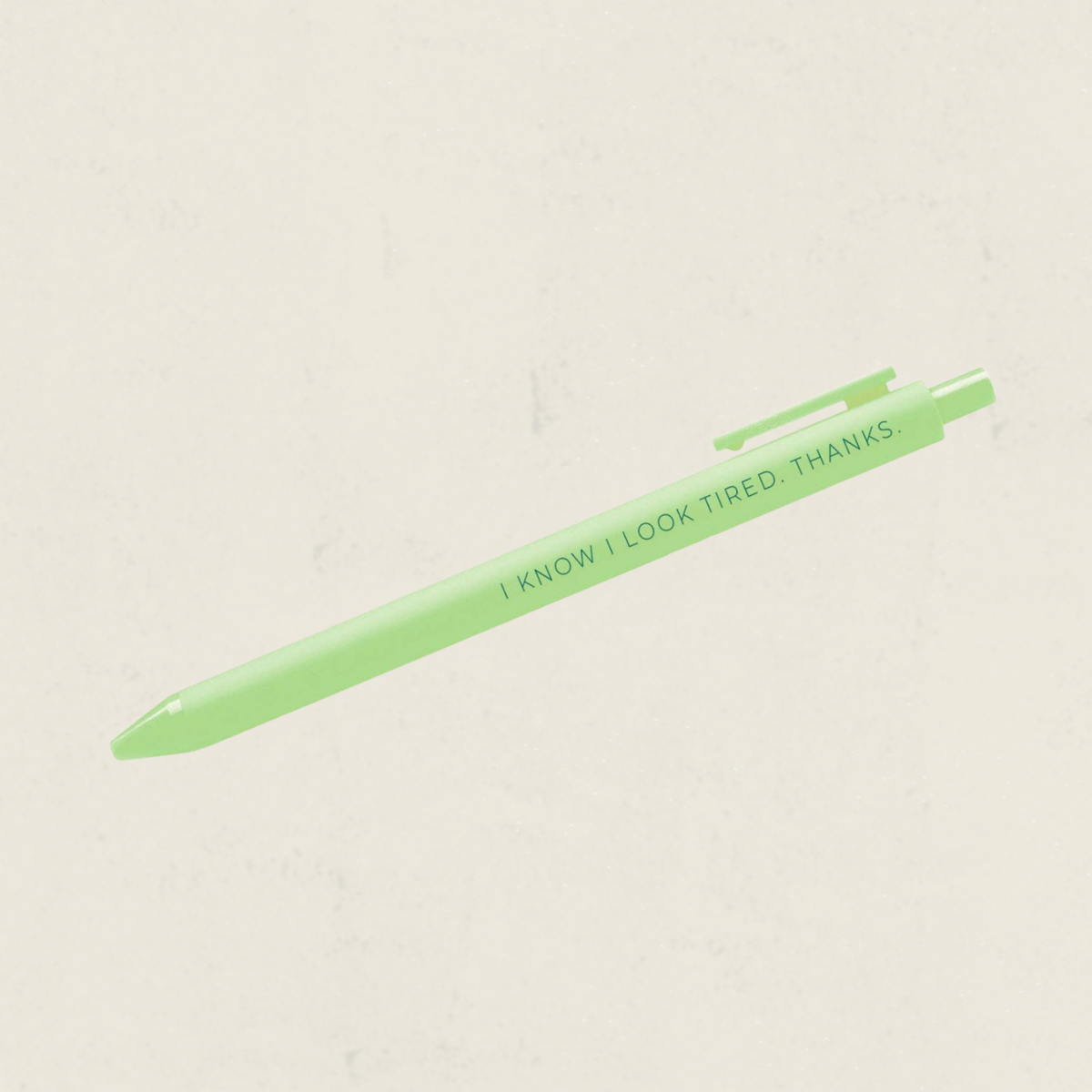 Stylo vert avec le message I know I look tired thanks, boutique Sans Filtre