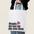 Sac fourre-tout blanc avec le message Desolee ma face fait des sous-titres, boutique Sans Filtre